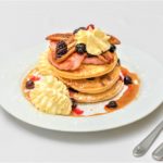 Pancake Stack With Berries Bacon And Banana at Boulevard Cafe Woodvale, Perth